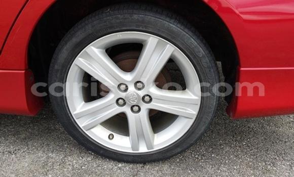 Buy Import Toyota Corolla Red Car in Kigali in Rwanda Buy Import Toyota Corolla Red Car in Kigali in Rwanda