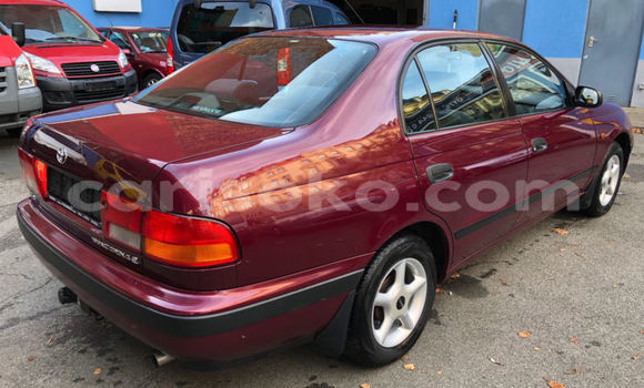 Buy Used Toyota Carina E Red Car in Kigali in Rwanda Buy Used Toyota Carina E Red Car in Kigali in Rwanda