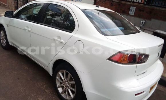 Buy Used Mitsubishi Lancer White Car in Kigali in Rwanda Buy Used Mitsubishi Lancer White Car in Kigali in Rwanda