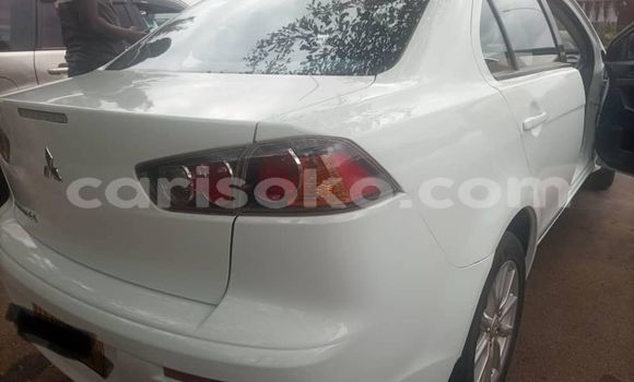 Buy Used Mitsubishi Lancer White Car in Kigali in Rwanda Buy Used Mitsubishi Lancer White Car in Kigali in Rwanda