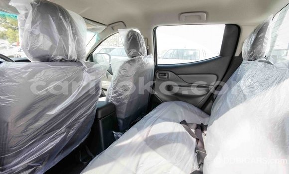 Acheter Import Voiture Mitsubishi L200 Blanc à Import - Dubai, Rwanda Acheter Import Voiture Mitsubishi L200 Blanc à Import - Dubai, Rwanda