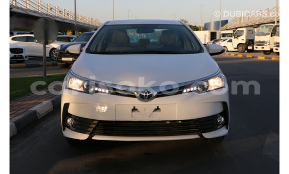Acheter Import Voiture Toyota Corolla Blanc à Import - Dubai, Rwanda Acheter Import Voiture Toyota Corolla Blanc à Import - Dubai, Rwanda