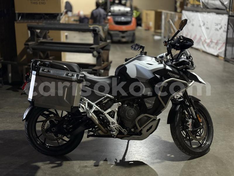 Big with watermark triumph tiger rwanda kigali 19917