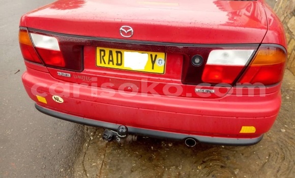 اشتري مستعمل Mazda 323 Rouge سيارة في Kigali في Rwanda
