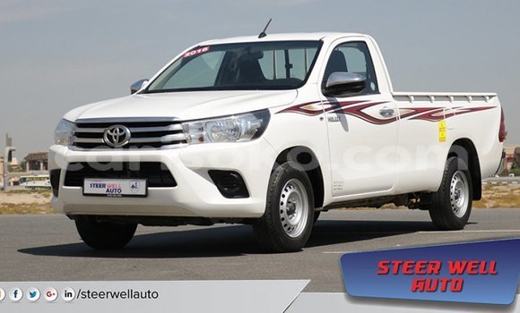 Sayi Imported Toyota Hilux Blanc Mota in Import - Dubai a Rwanda Sayi Imported Toyota Hilux Blanc Mota in Import - Dubai a Rwanda
