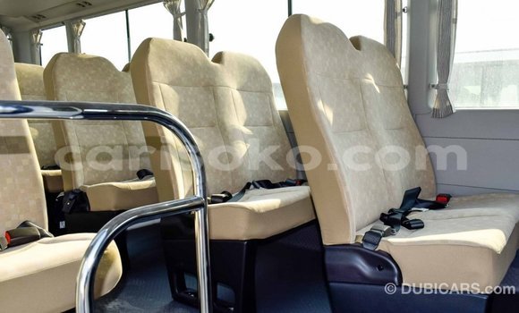 Acheter Import Voiture Toyota Coaster Blanc à Import - Dubai, Rwanda Acheter Import Voiture Toyota Coaster Blanc à Import - Dubai, Rwanda