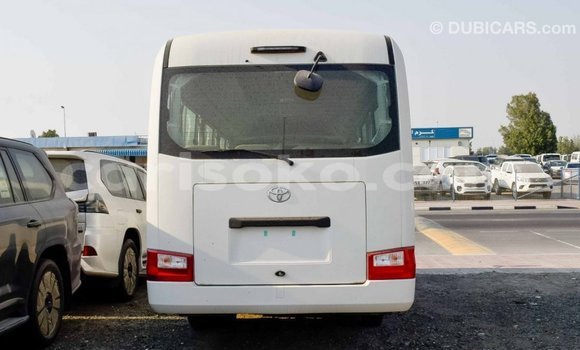 Acheter Import Voiture Toyota Coaster Blanc à Import - Dubai, Rwanda Acheter Import Voiture Toyota Coaster Blanc à Import - Dubai, Rwanda