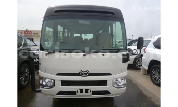 Acheter Import Voiture Toyota Coaster Blanc à Import - Dubai, Rwanda Acheter Import Voiture Toyota Coaster Blanc à Import - Dubai, Rwanda