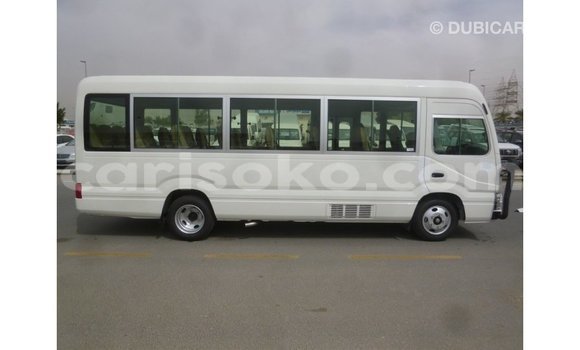 Acheter Import Voiture Toyota Coaster Blanc à Import - Dubai, Rwanda Acheter Import Voiture Toyota Coaster Blanc à Import - Dubai, Rwanda
