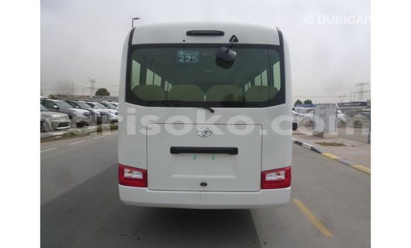 Acheter Import Voiture Toyota Coaster Blanc à Import - Dubai, Rwanda Acheter Import Voiture Toyota Coaster Blanc à Import - Dubai, Rwanda
