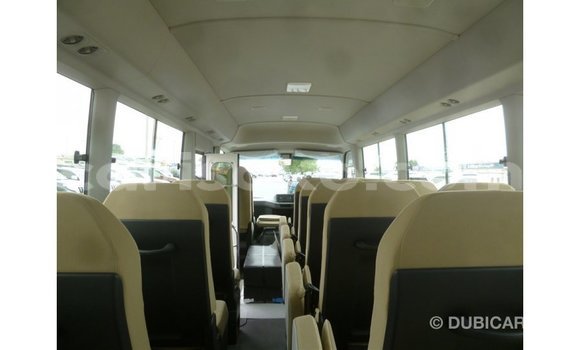 Acheter Import Voiture Toyota Coaster Blanc à Import - Dubai, Rwanda Acheter Import Voiture Toyota Coaster Blanc à Import - Dubai, Rwanda