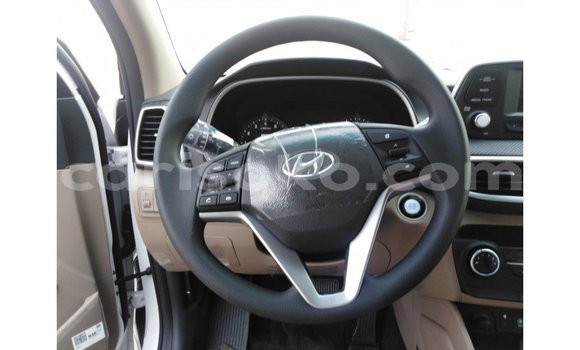 Sayi Imported Hyundai Tucson Blanc Mota in Import - Dubai a Rwanda Sayi Imported Hyundai Tucson Blanc Mota in Import - Dubai a Rwanda