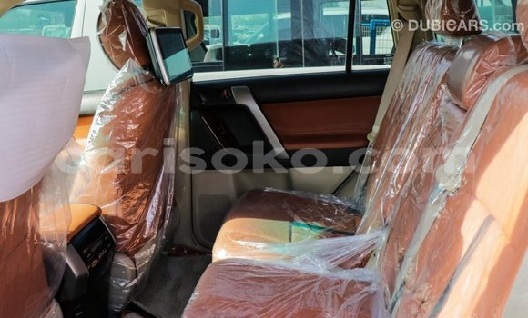 Acheter Import Voiture Toyota Prado Rouge à Import - Dubai, Rwanda Acheter Import Voiture Toyota Prado Rouge à Import - Dubai, Rwanda